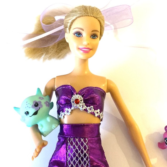 Barbie doll wearing mermaid fin and bikini top - Picture 3 of 8
